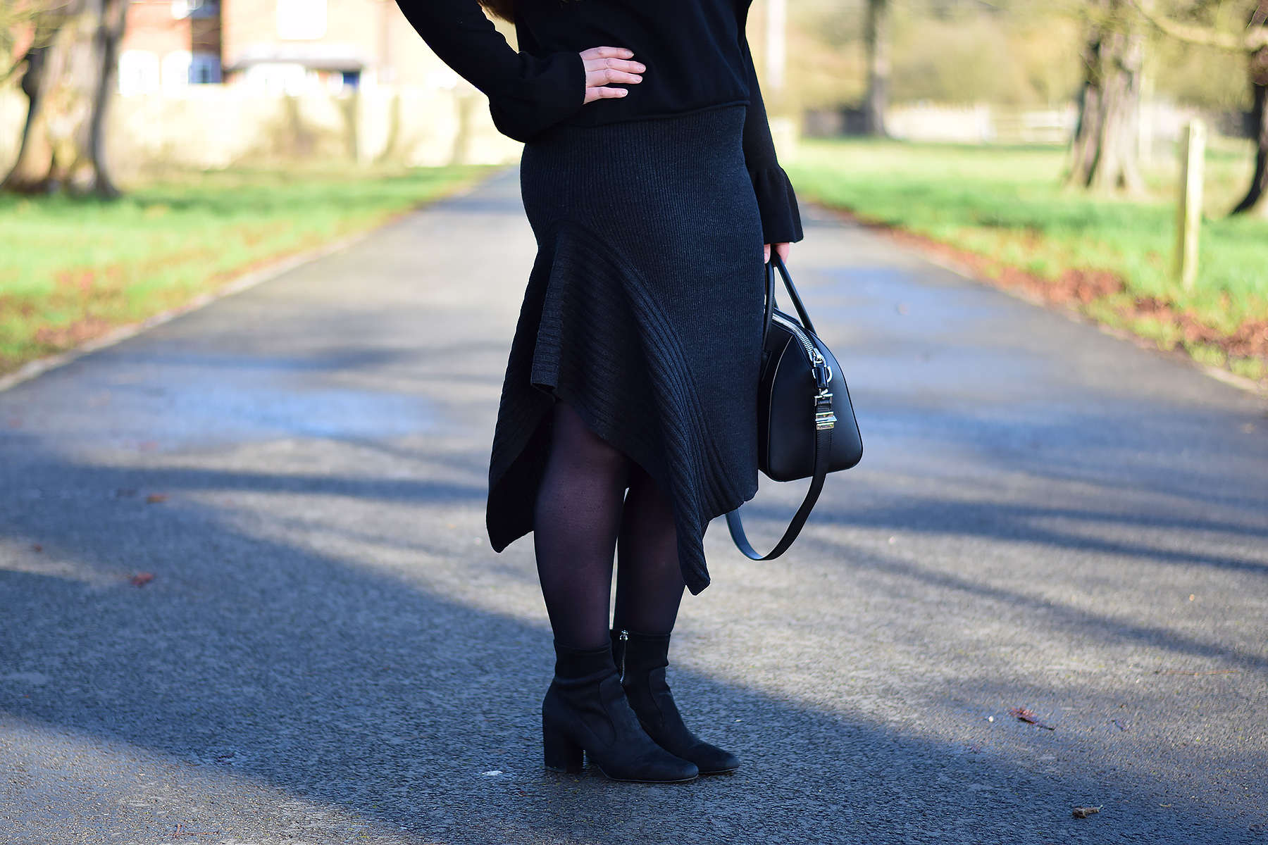How to elevate your winter outfit with ruffles and asymmetric hemlines ...