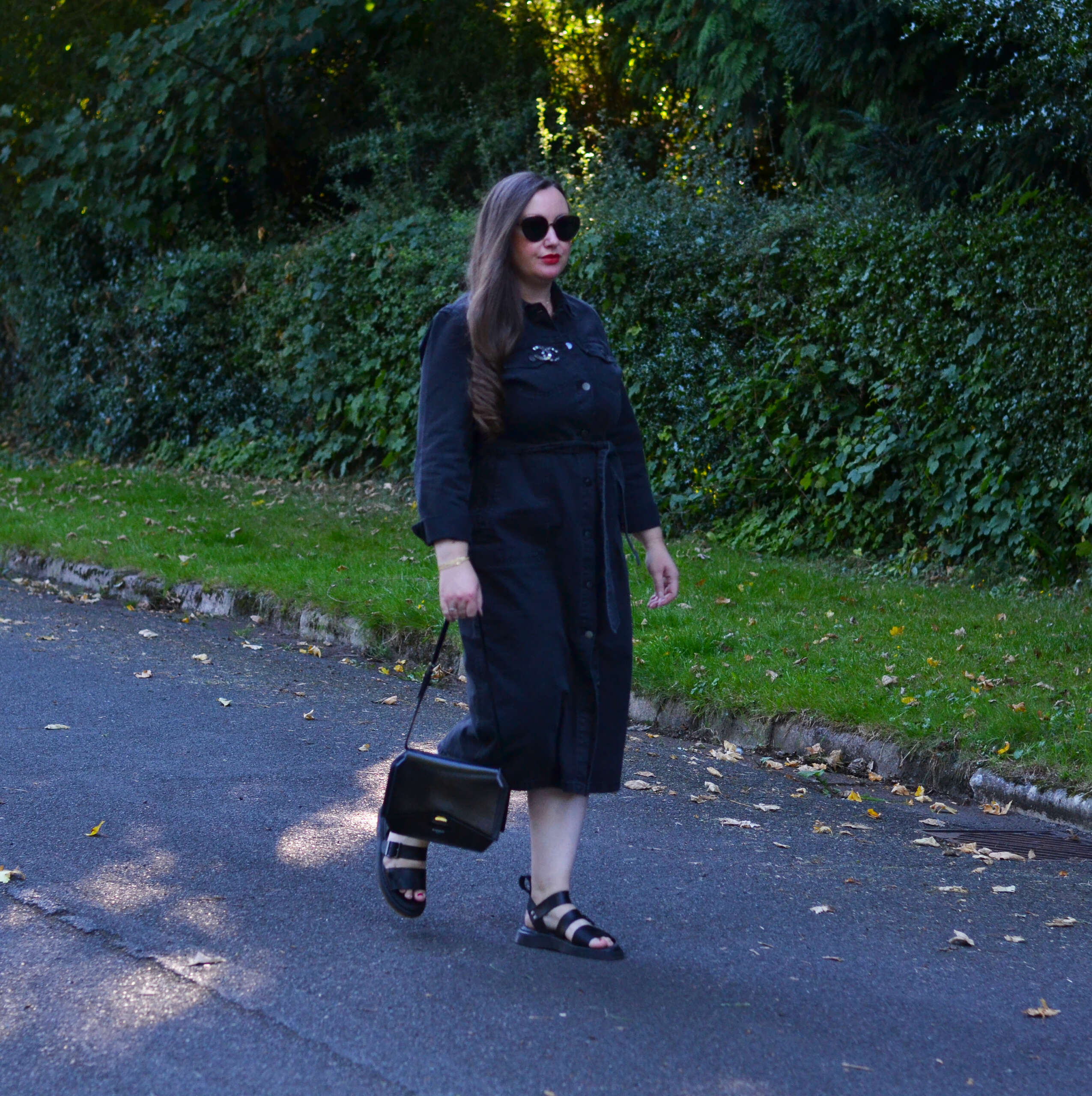 Black denim dress with chanel brooch